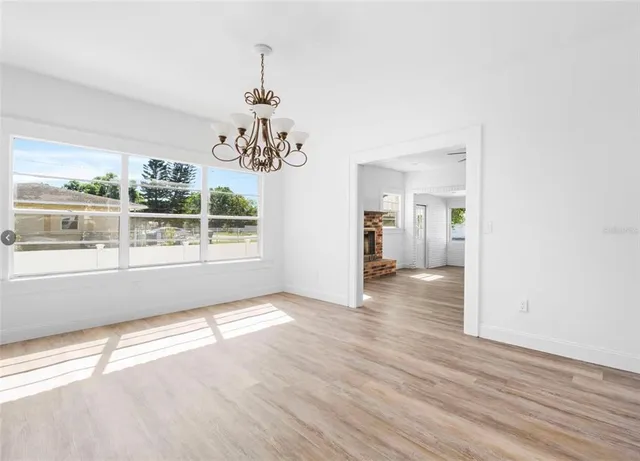 a view of livingroom with wooden floor and window
