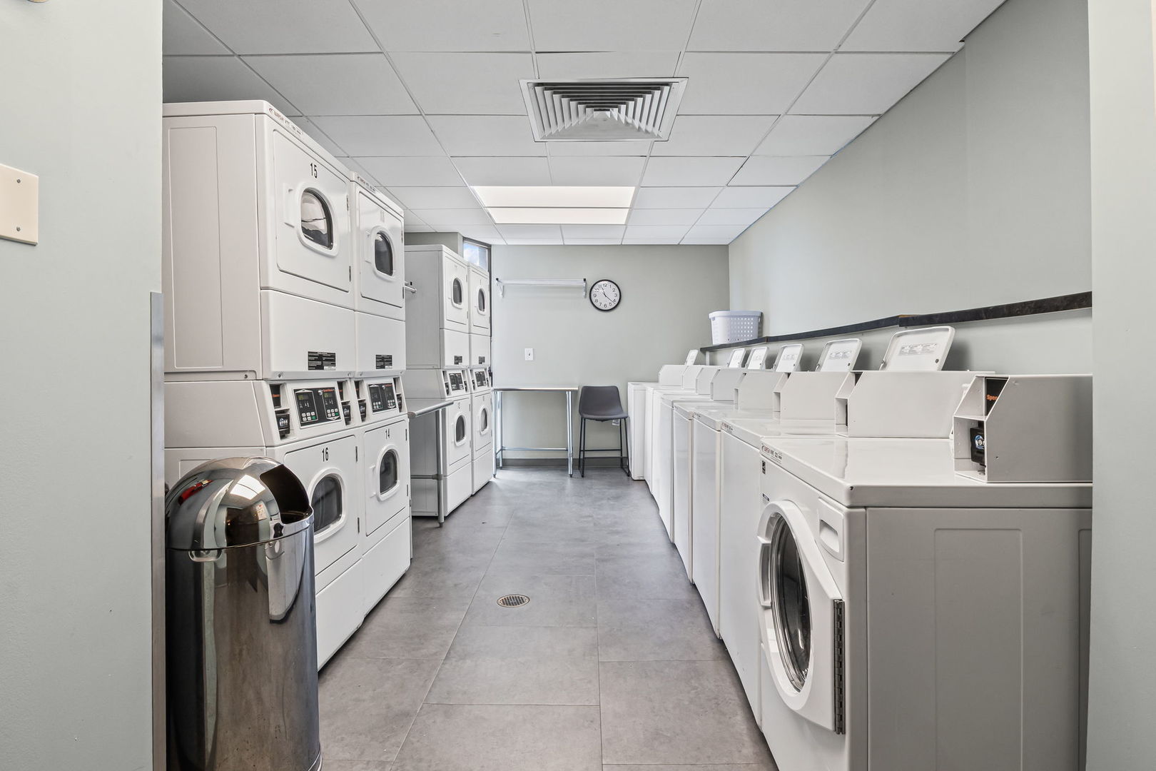 3150 North Sheridan Road, Unit 2C Chicago, IL 60657 - Photo 22 of 25 a utility room with dryer and washer