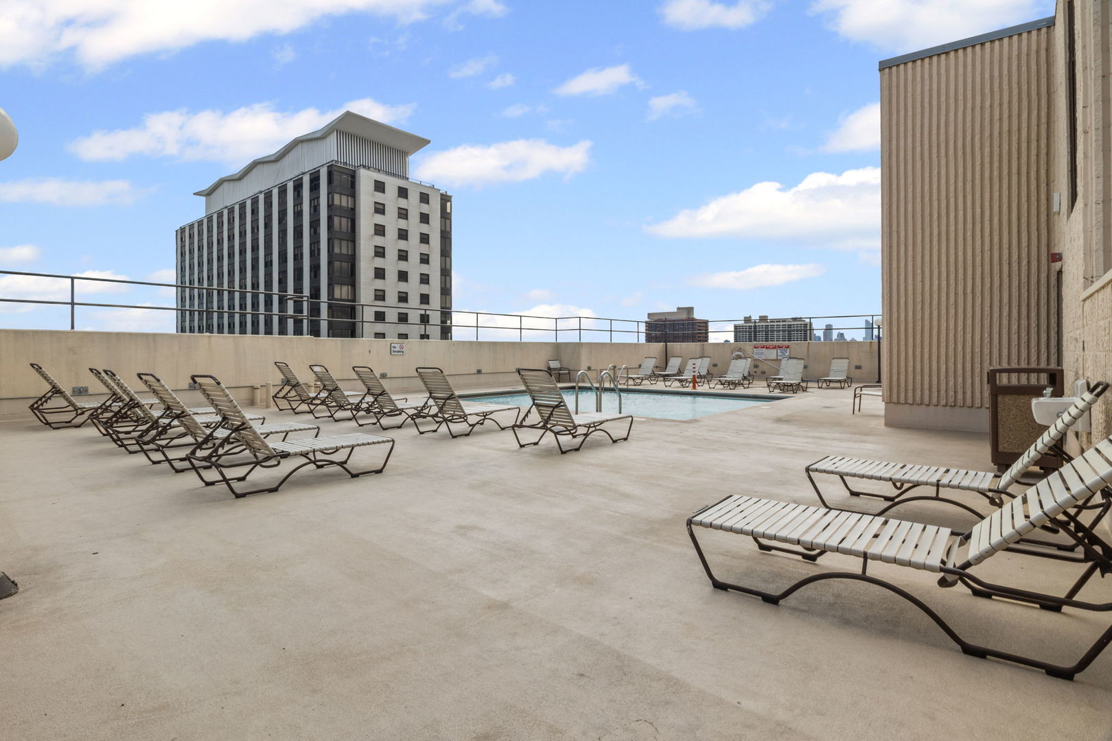 3150 North Sheridan Road, Unit 2C Chicago, IL 60657 - Photo 24 of 25 a view of a terrace with chairs