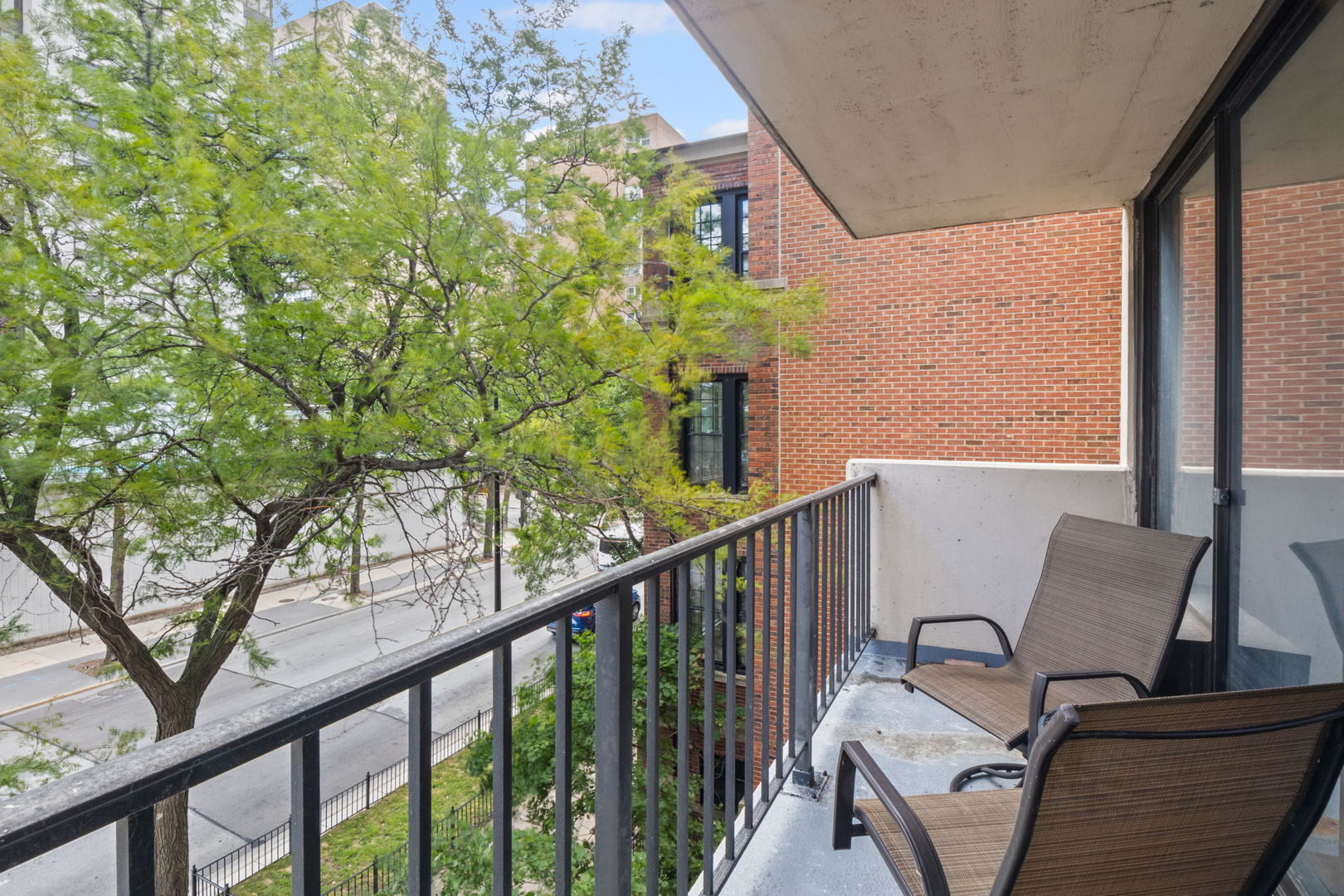 3150 North Sheridan Road, Unit 2C Chicago, IL 60657 - Photo 5 of 25 a view of balcony with wooden floor