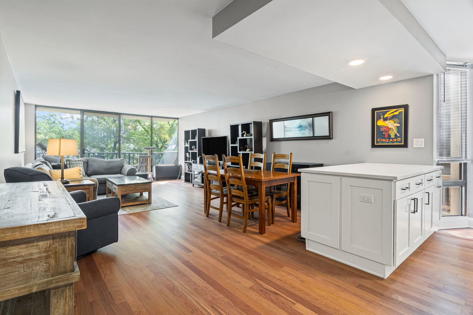 3150 North Sheridan Road, Unit 2C Chicago, IL 60657 - Photo 7 of 25 a view of a living room and dining room
