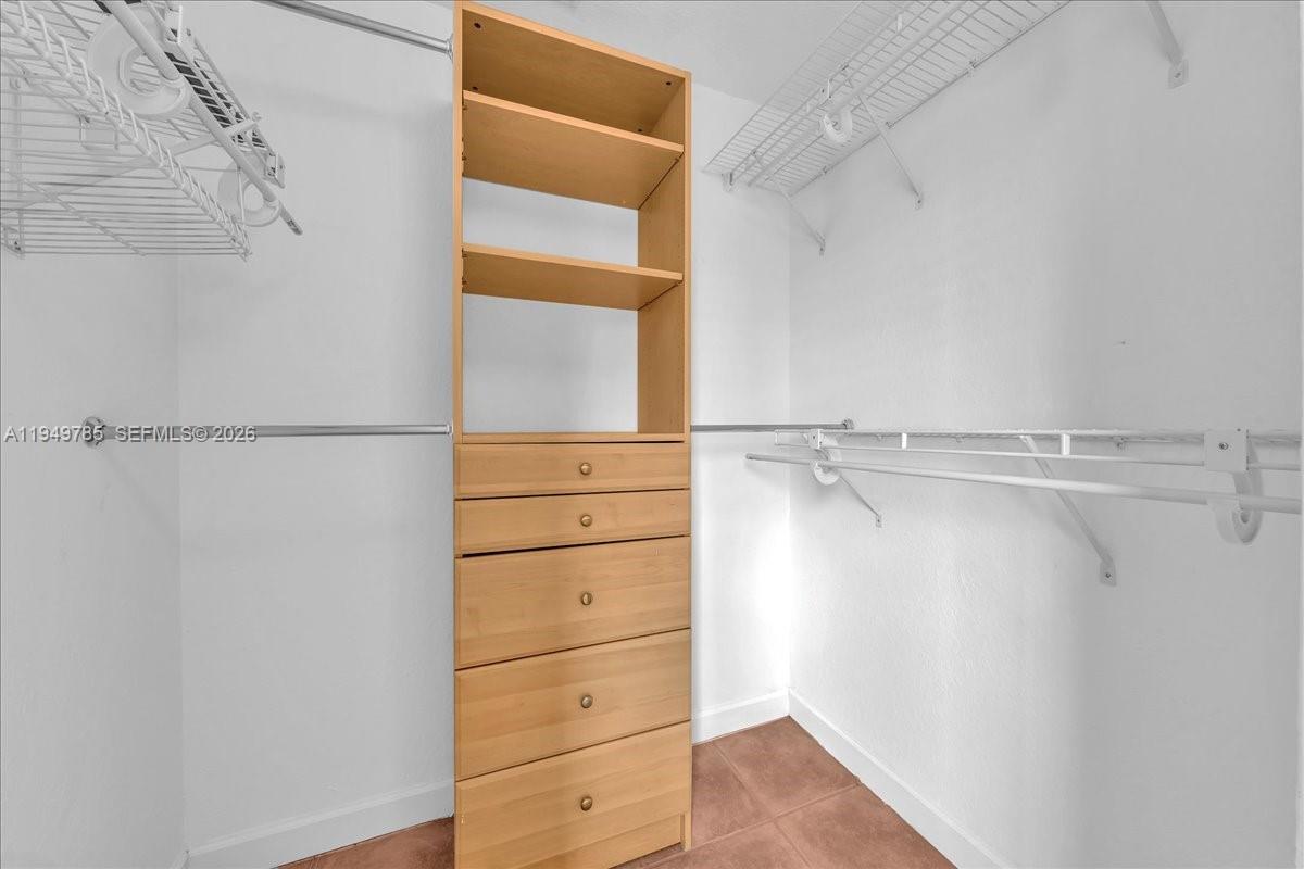 4341 Southwest 160th Avenue, Unit 201 Miramar, FL 33027 - Photo 40 of 53 a view of an empty walk in closet