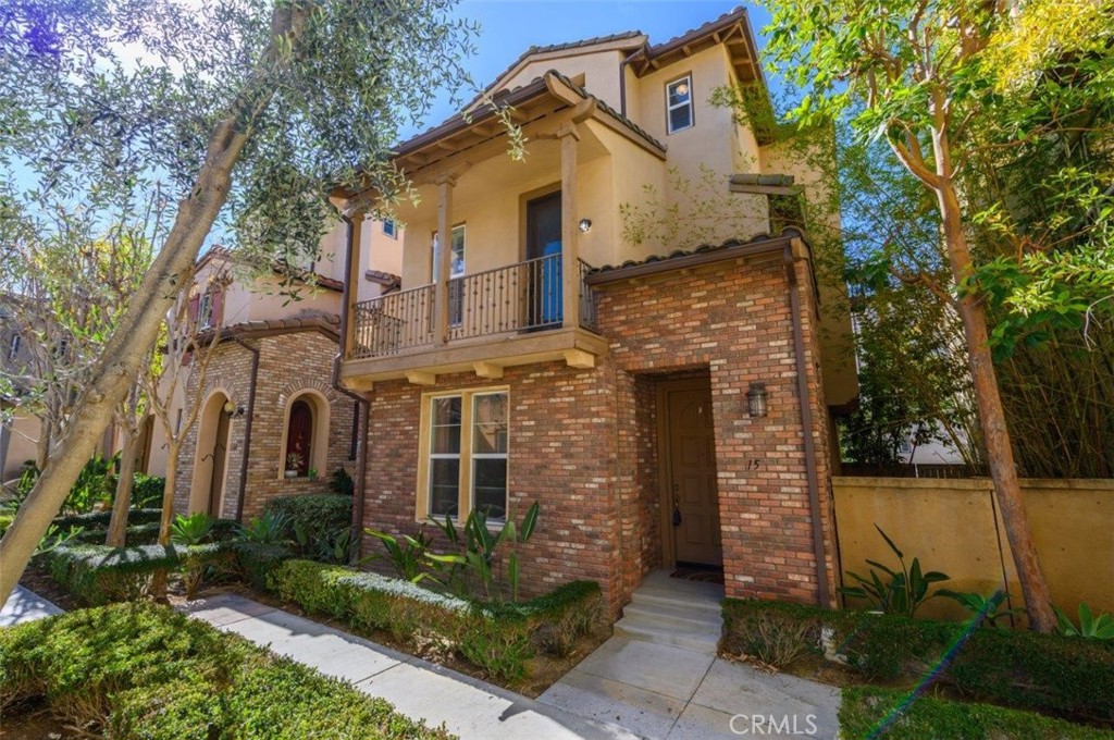 15 Tall Oak Irvine, CA 92603 - Photo 40 of 66 a front view of a house with garden
