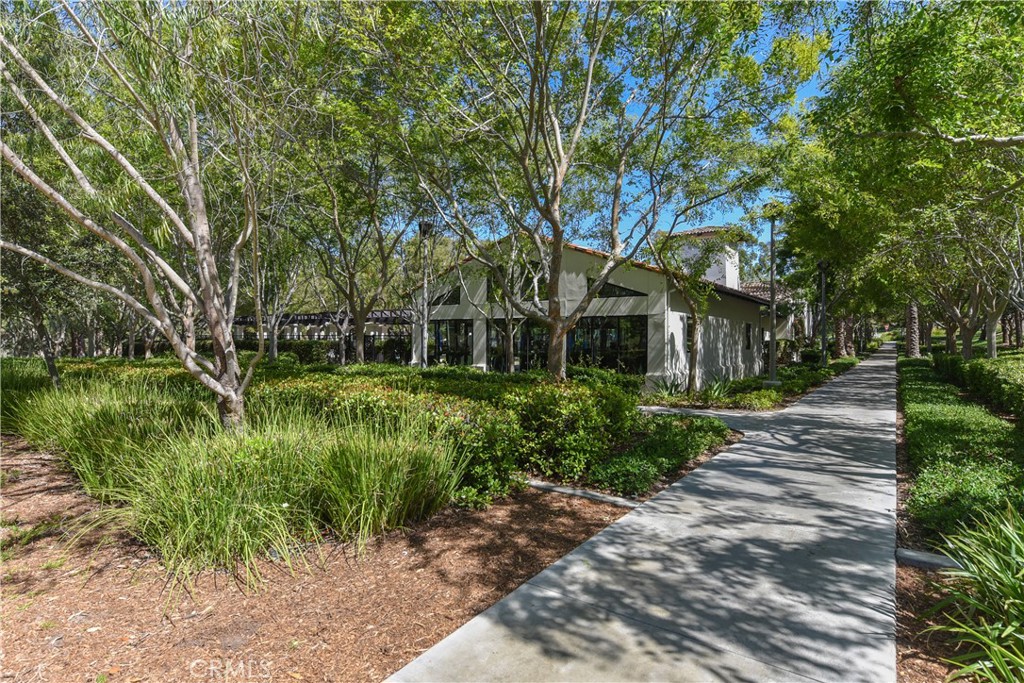15 Tall Oak Irvine, CA 92603 - Photo 54 of 66 a front view of a house with a yard