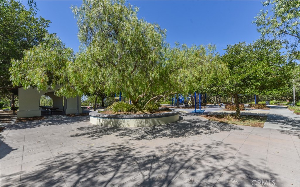 15 Tall Oak Irvine, CA 92603 - Photo 59 of 66 a view of a tree in the middle of a yard