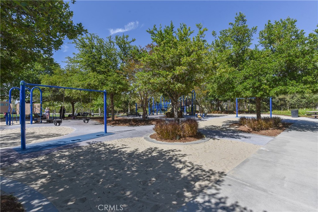 15 Tall Oak Irvine, CA 92603 - Photo 60 of 66 a view of a park with trees and flowers