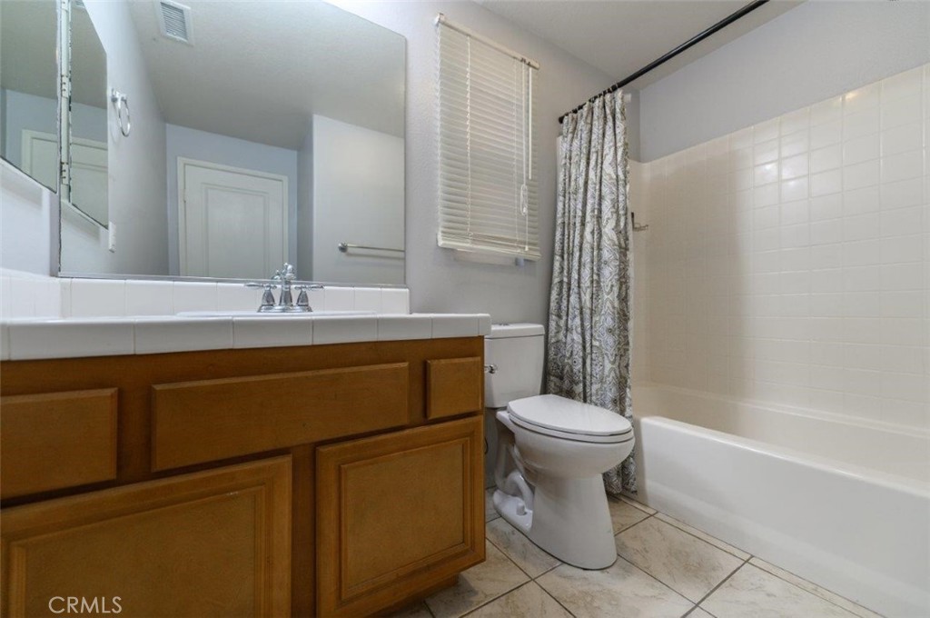 15 Tall Oak Irvine, CA 92603 - Photo 6 of 66 a bathroom with a sink toilet and shower