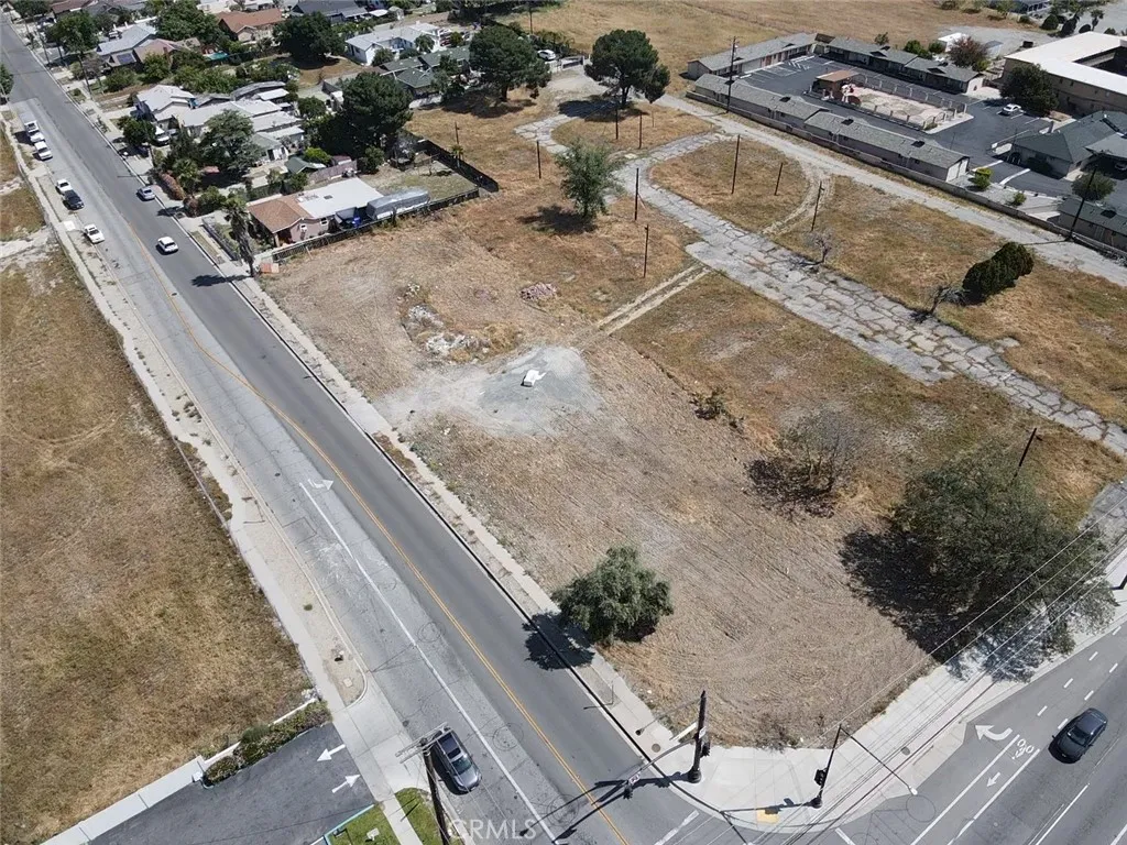 16304 Foothill Fontana, CA 92335 - Photo 24 of 36 an aerial view of a house with a swimming pool