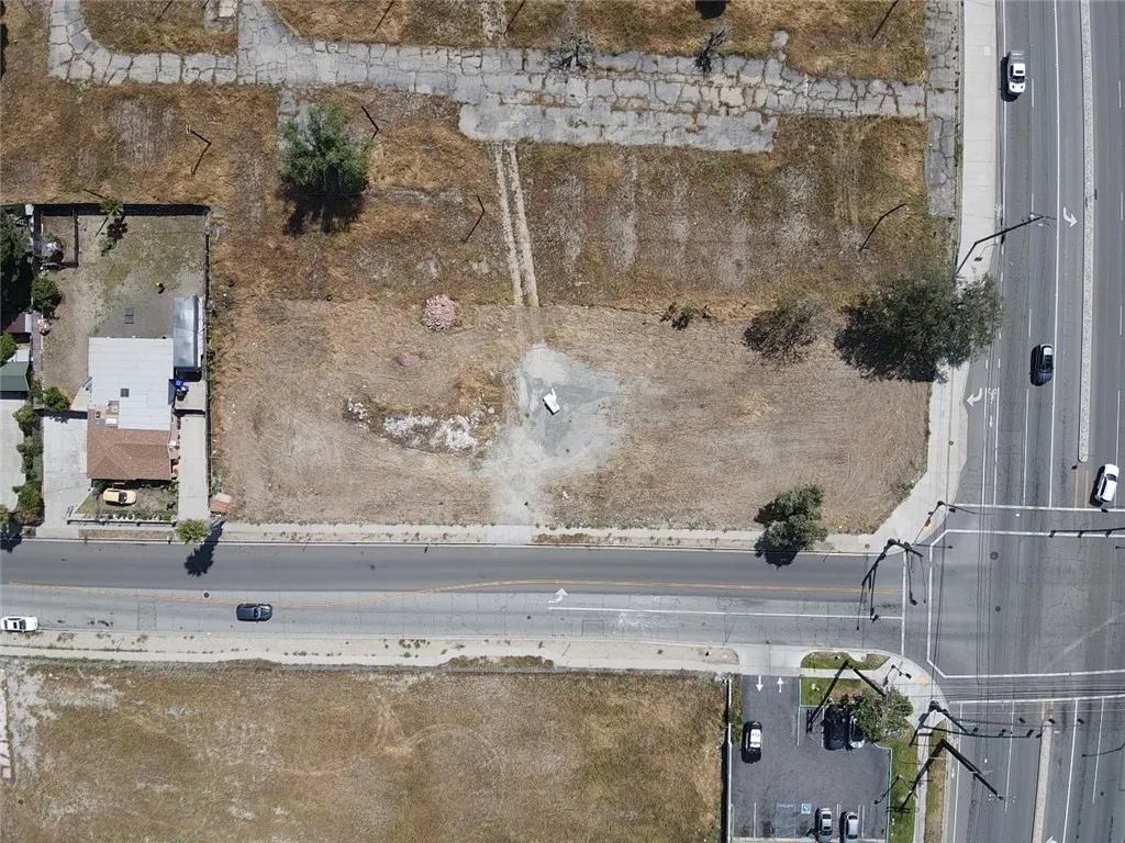 16304 Foothill Fontana, CA 92335 - Photo 31 of 36 a bathroom with a granite countertop shower and a sink