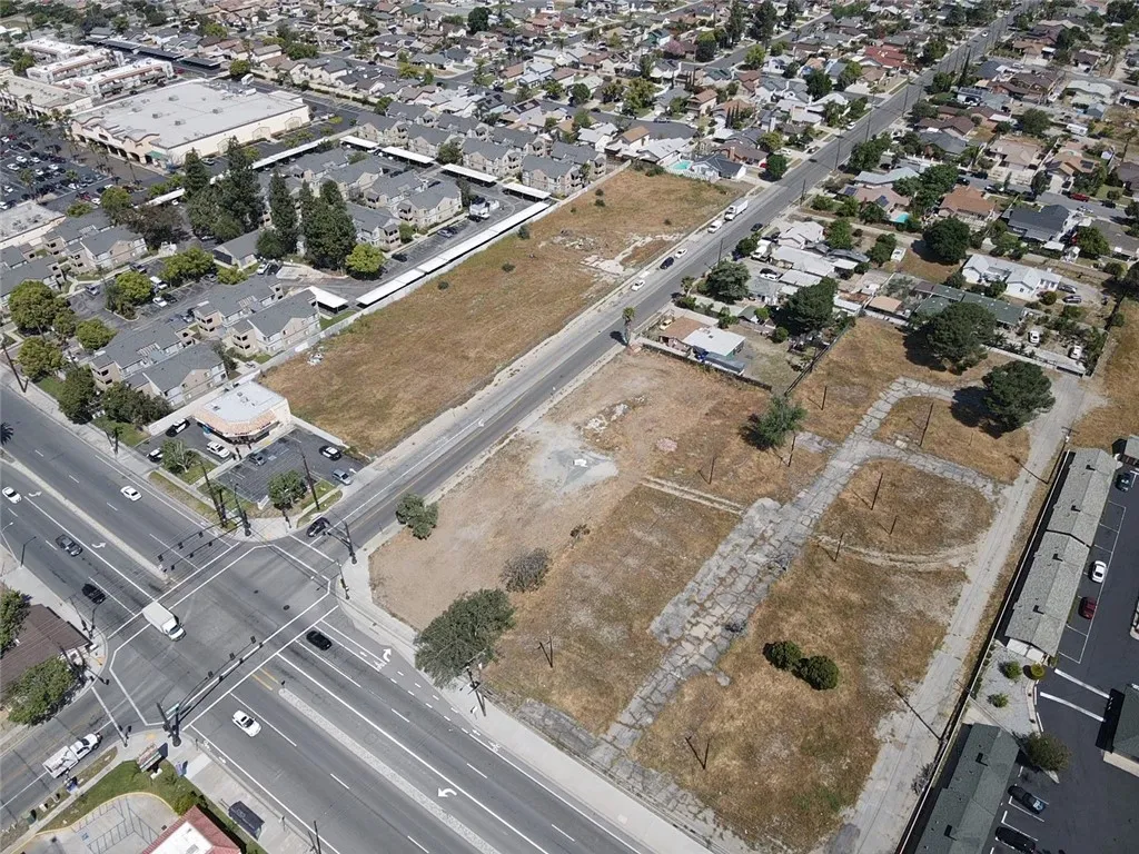 16304 Foothill Fontana, CA 92335 - Photo 6 of 36 an aerial view of residential houses with outdoor space