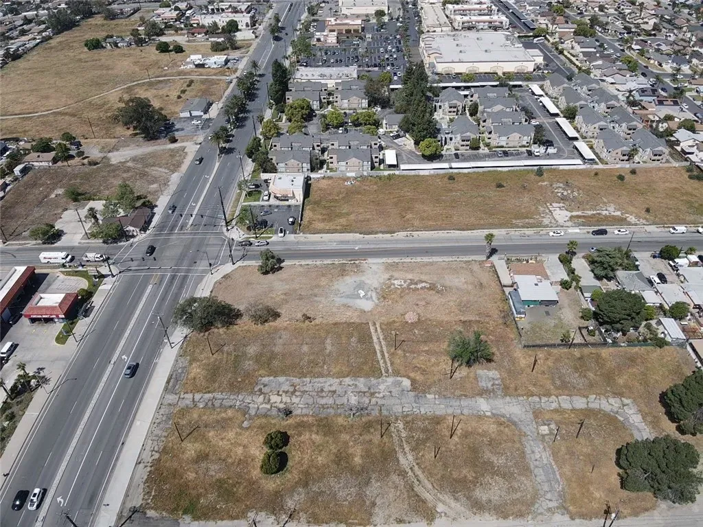 16304 Foothill Fontana, CA 92335 - Photo 9 of 36 an aerial view of residential houses with outdoor space