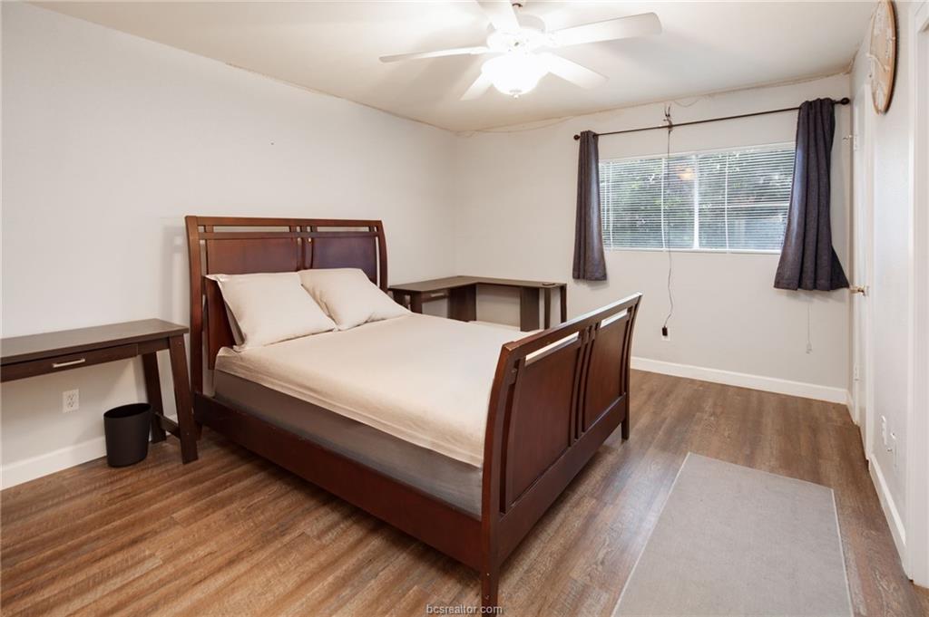 1501 Stallings Drive, Unit 60 College Station, TX 77840 - Photo 11 of 17 a bedroom with bed and window