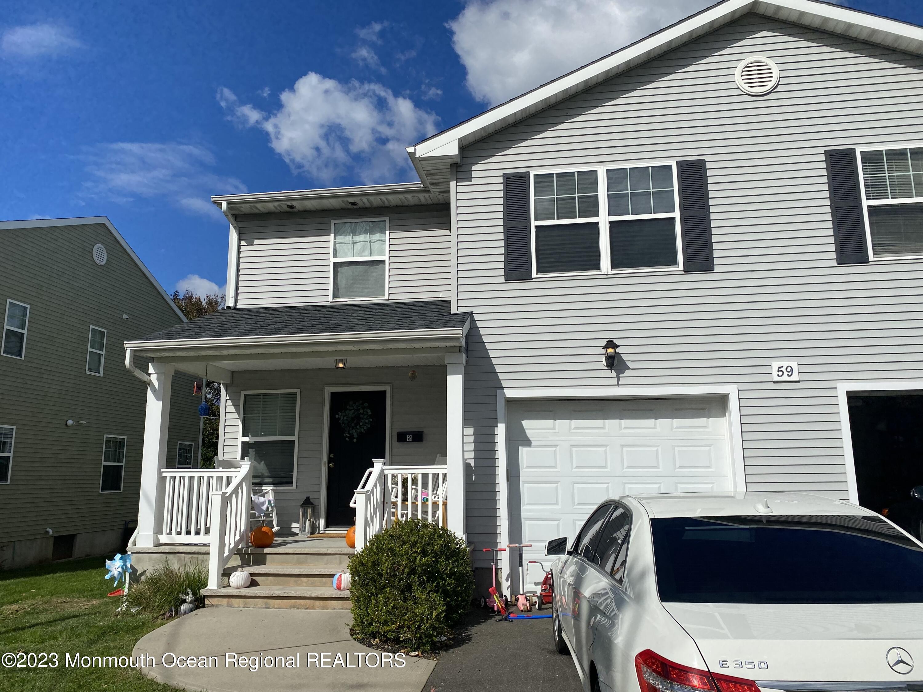 a view of a house with a tub and garden