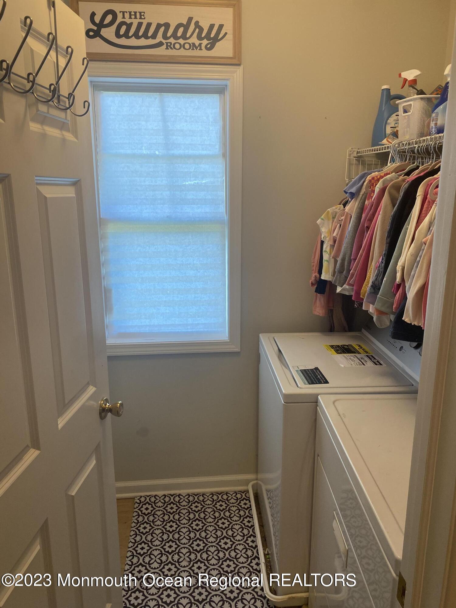 59 Court Street, Unit 2 Long Branch, NJ 07740 - Photo 8 of 8 a view of bathroom with washer and dryer