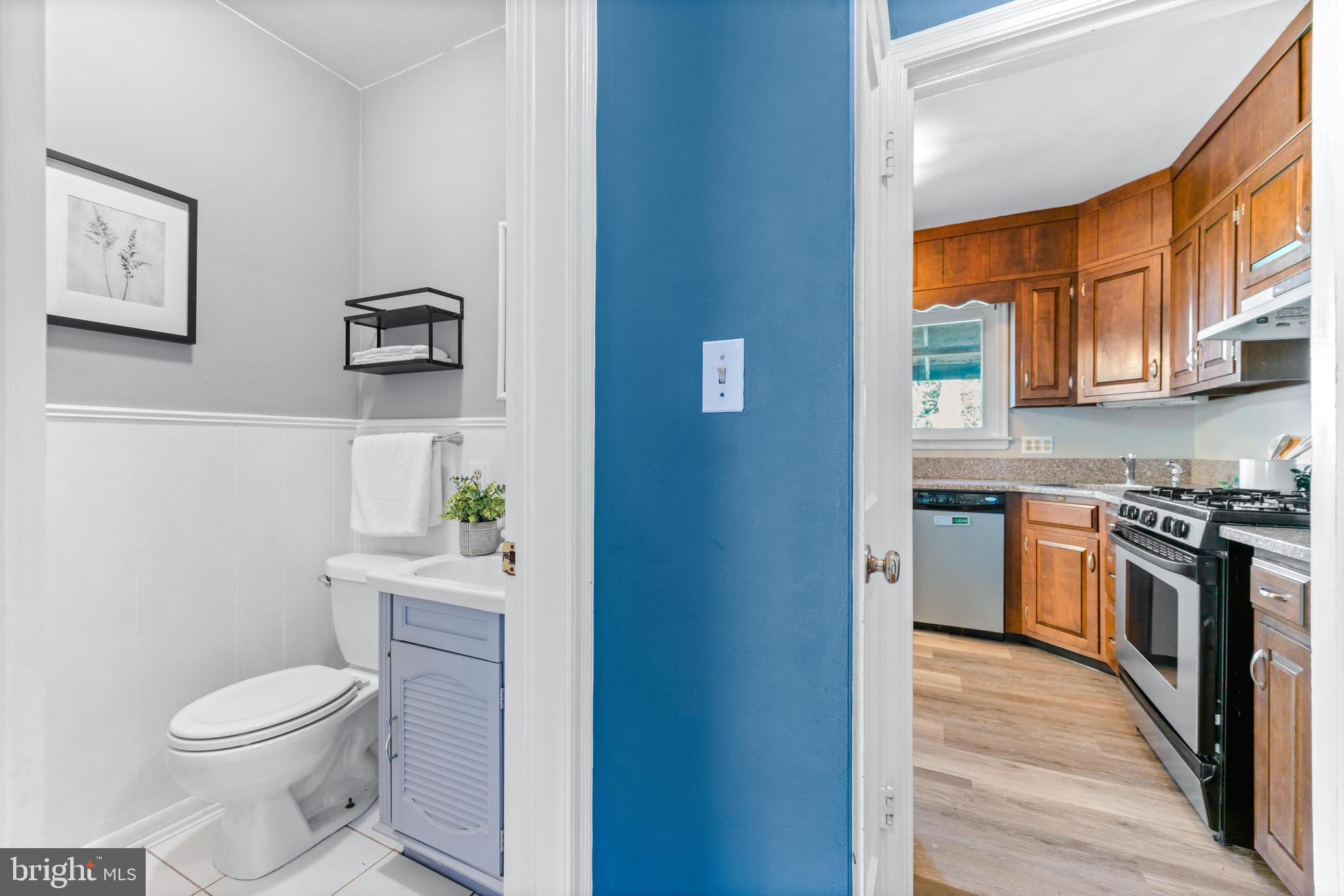 1840 Deveron Road Towson, MD 21286 - Photo 11 of 43 a kitchen with a stove a sink and a microwave