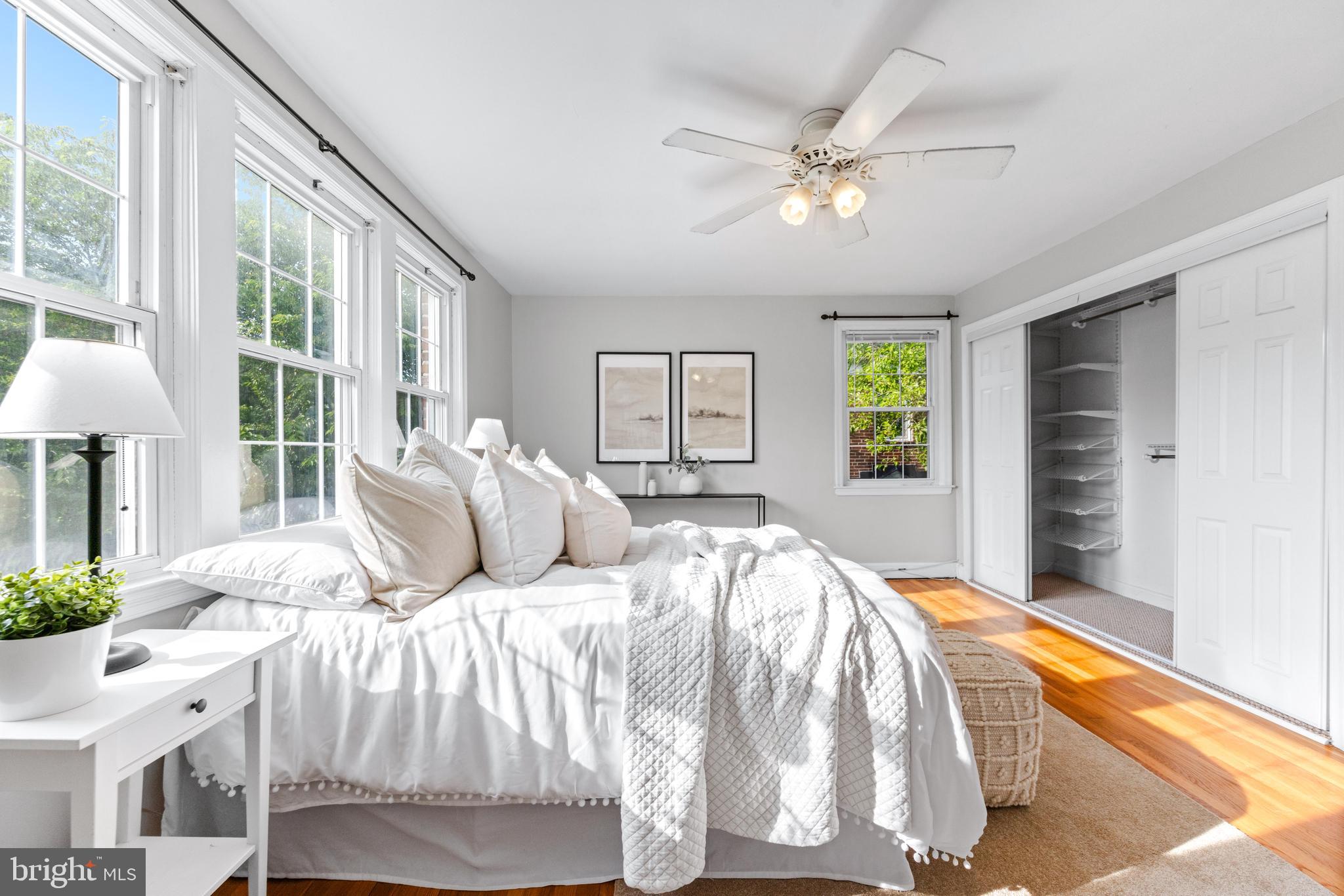 1840 Deveron Road Towson, MD 21286 - Photo 22 of 43 a bedroom with a large bed and a chandelier