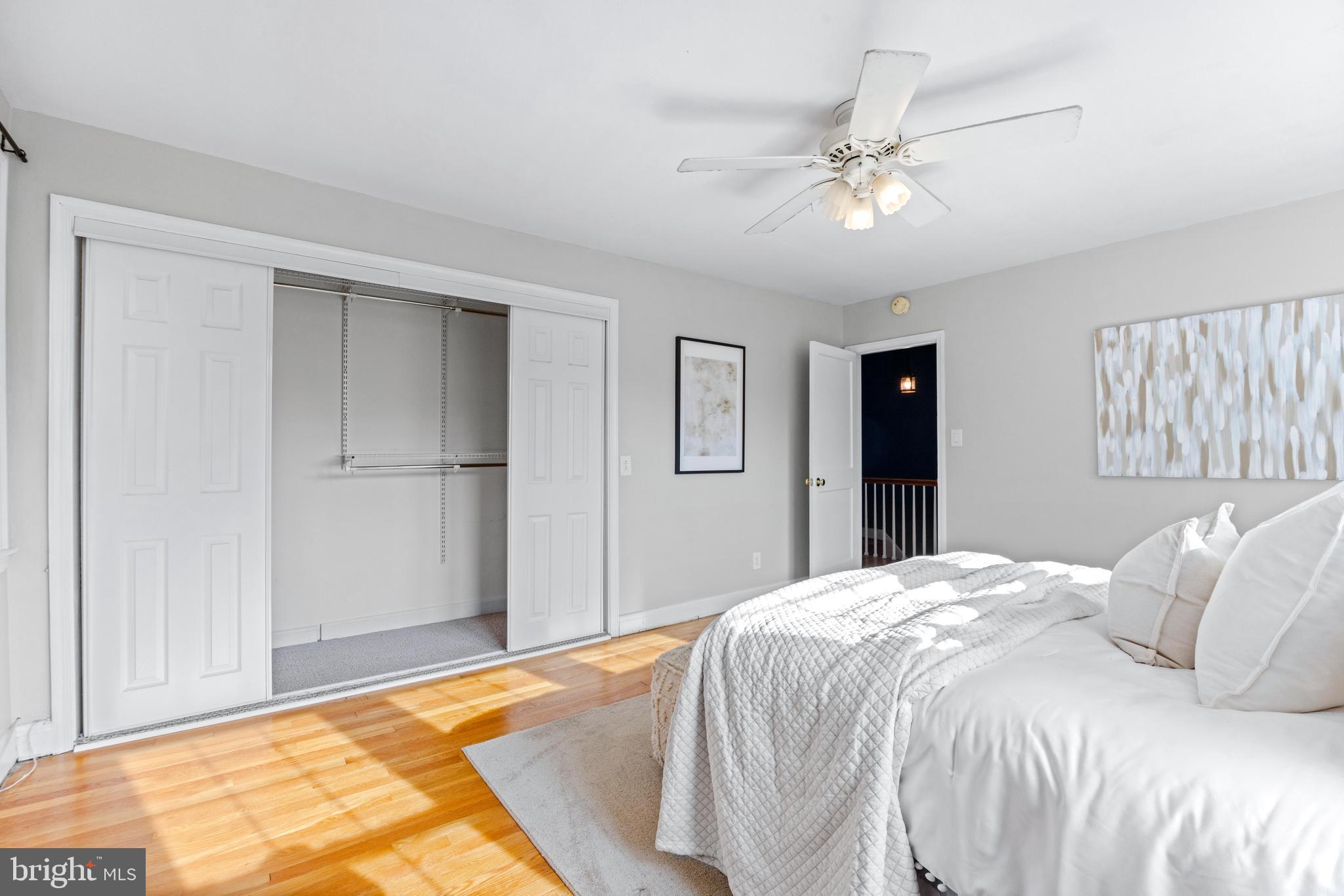 1840 Deveron Road Towson, MD 21286 - Photo 23 of 43 a bedroom with a large bed and a chandelier