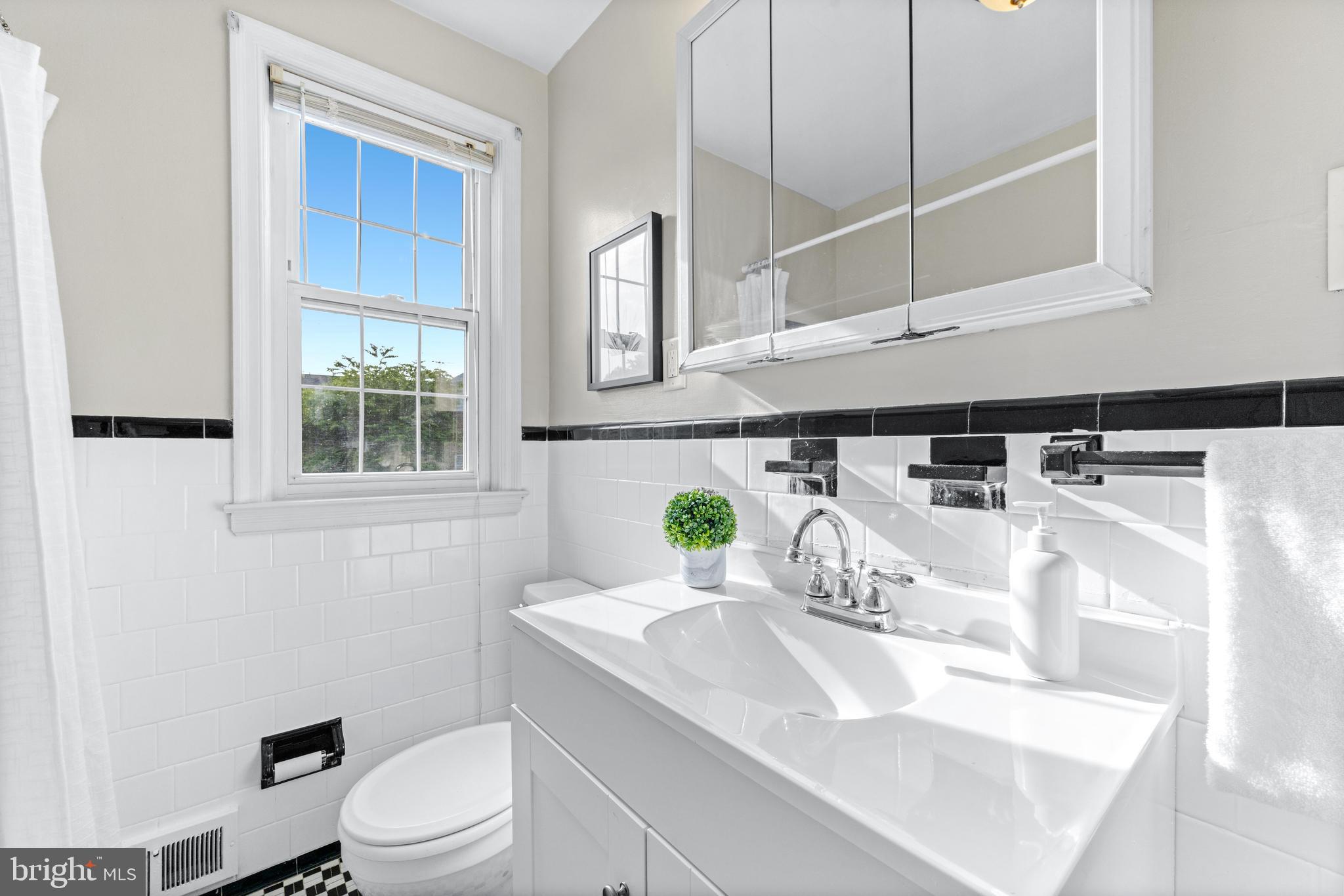1840 Deveron Road Towson, MD 21286 - Photo 25 of 43 a bathroom with a sink a toilet and shower