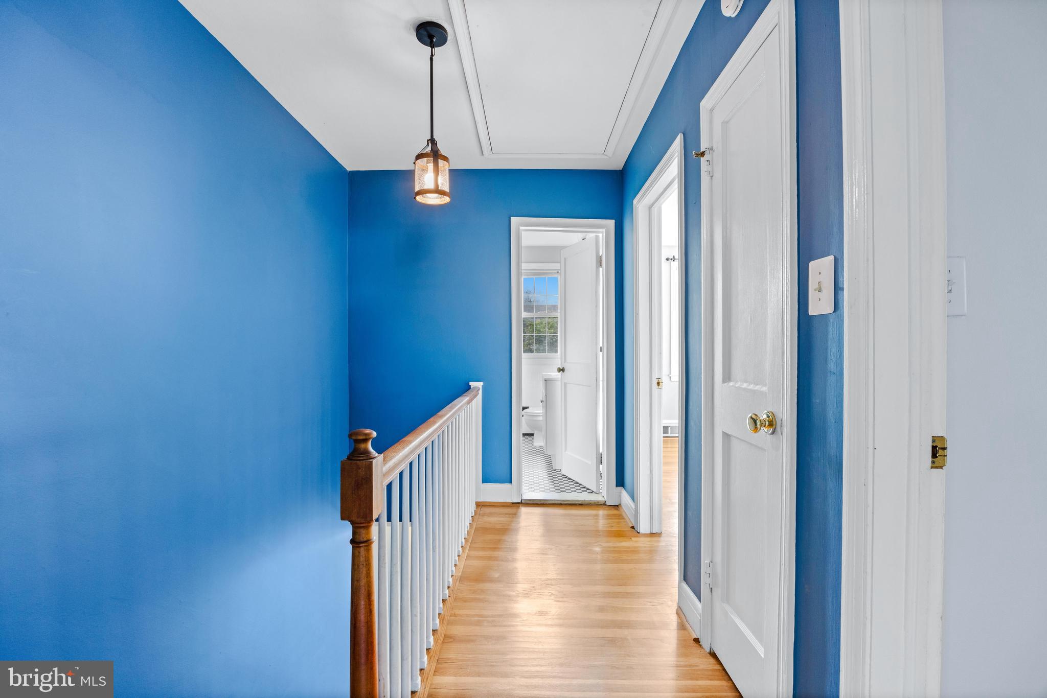 1840 Deveron Road Towson, MD 21286 - Photo 28 of 43 a view of a hallway with wooden floor and staircase