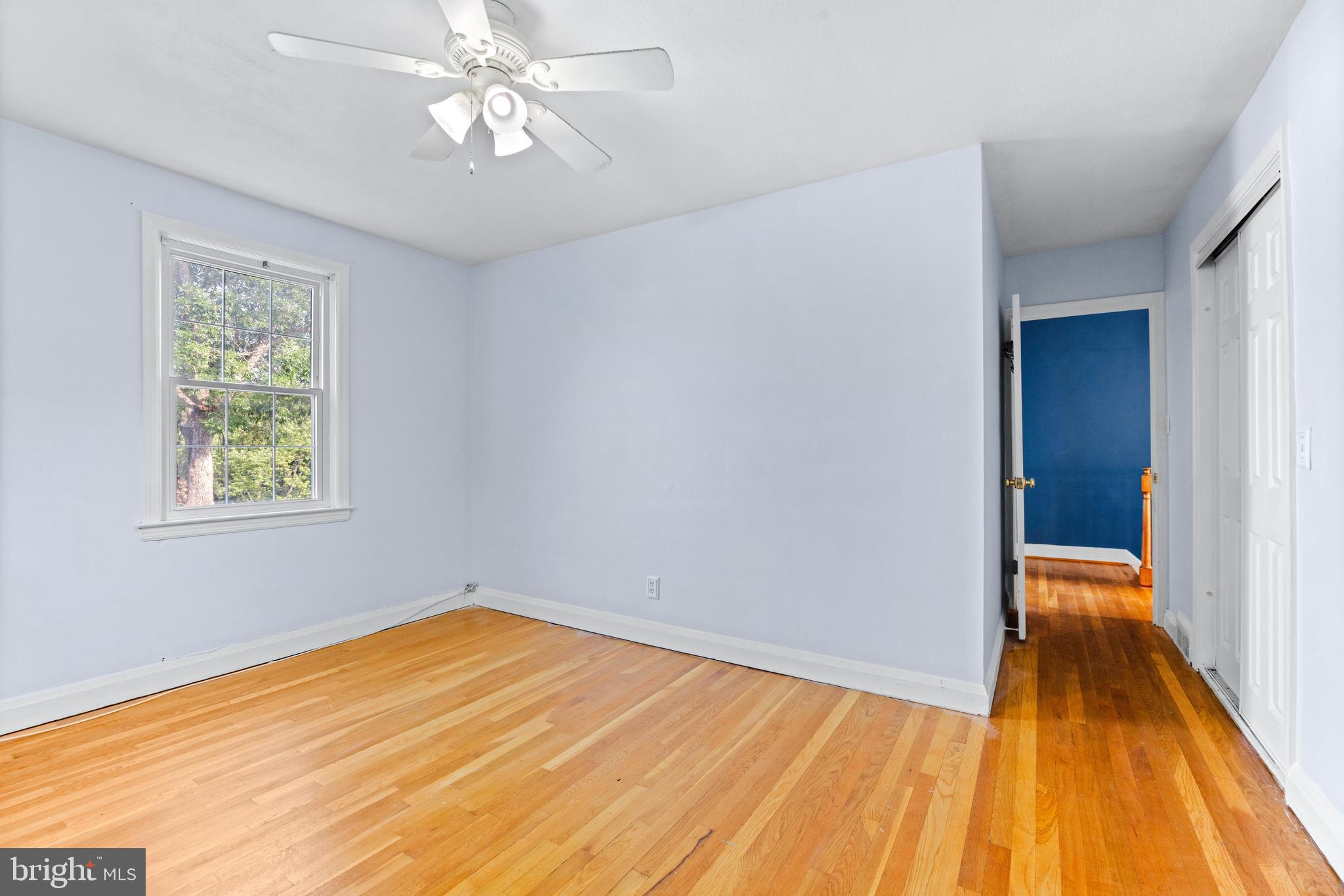 1840 Deveron Road Towson, MD 21286 - Photo 31 of 43 wooden floor in an empty room with a window