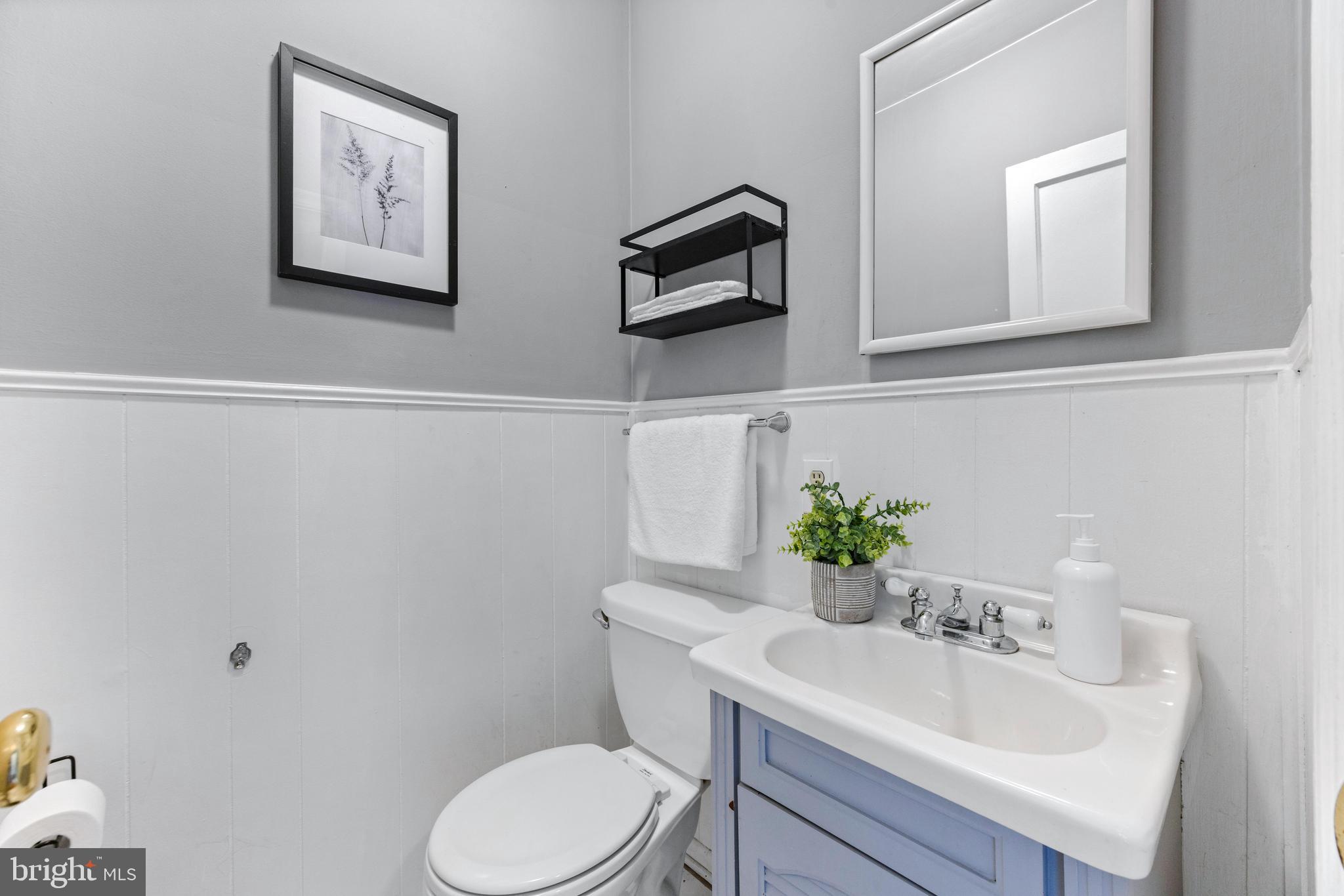 1840 Deveron Road Towson, MD 21286 - Photo 10 of 43 a bathroom with a sink mirror and toilet