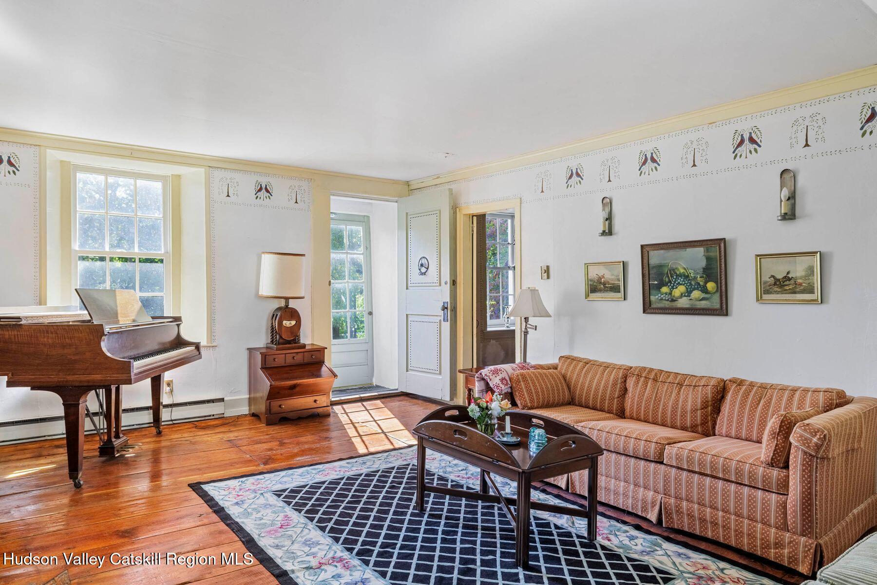 392-396 Cottekill Road Kingston, NY 12401 - Photo 11 of 34 a living room with furniture rug and window