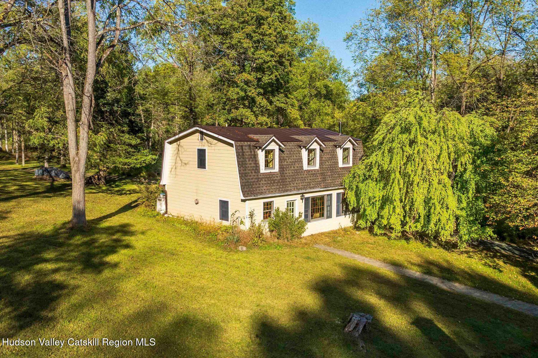392-396 Cottekill Road Kingston, NY 12401 - Photo 18 of 34 a view of a house with yard and sitting area