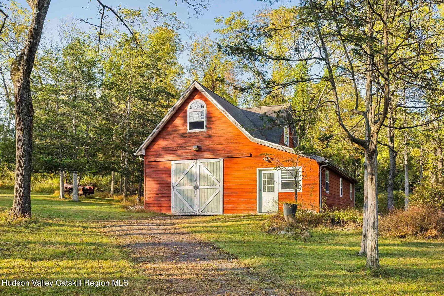 392-396 Cottekill Road Kingston, NY 12401 - Photo 22 of 34 a front view of a house with a yard
