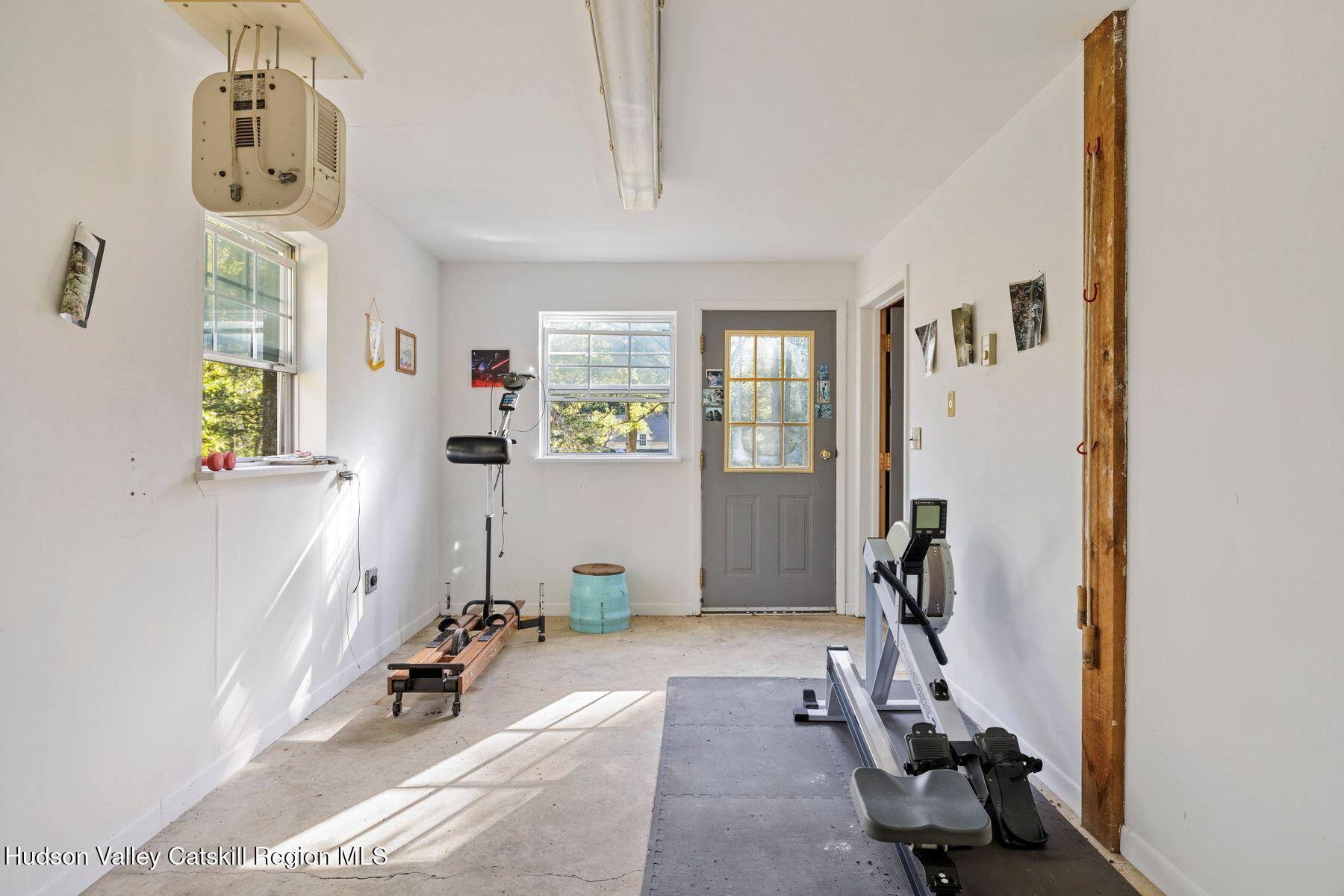 392-396 Cottekill Road Kingston, NY 12401 - Photo 24 of 34 a view of a room with gym equipment