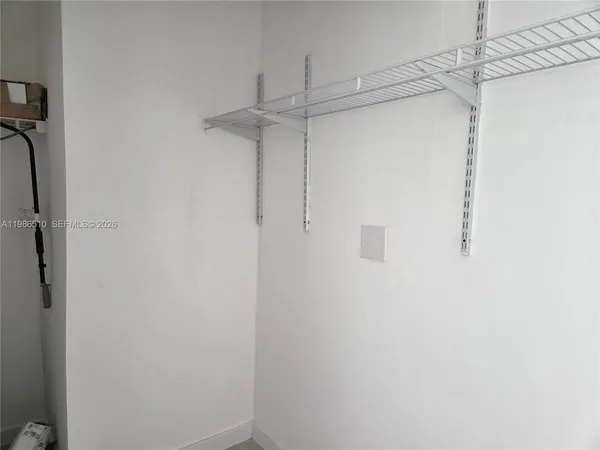 a bathroom with a sink a vanity and a mirror