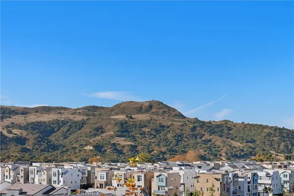 a view of city and mountain