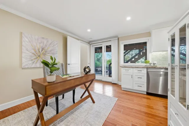 a workspace with furniture and window