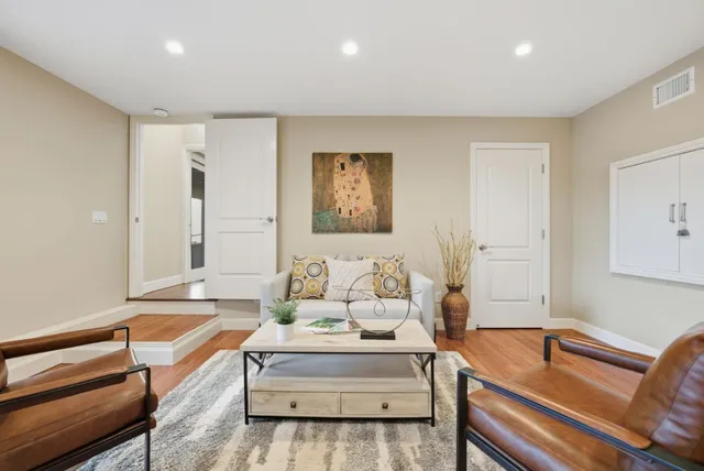 a living room with furniture and a couch
