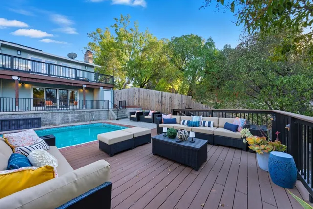 a view of a couches with wooden floor