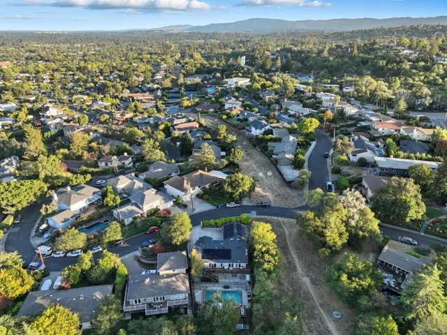 an aerial view of residential house with outdoor space