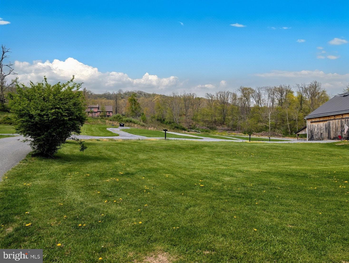 1568 Cumberland Road Bedford, PA 15522 - Photo 9 of 37 a view of a town with mountains in the background
