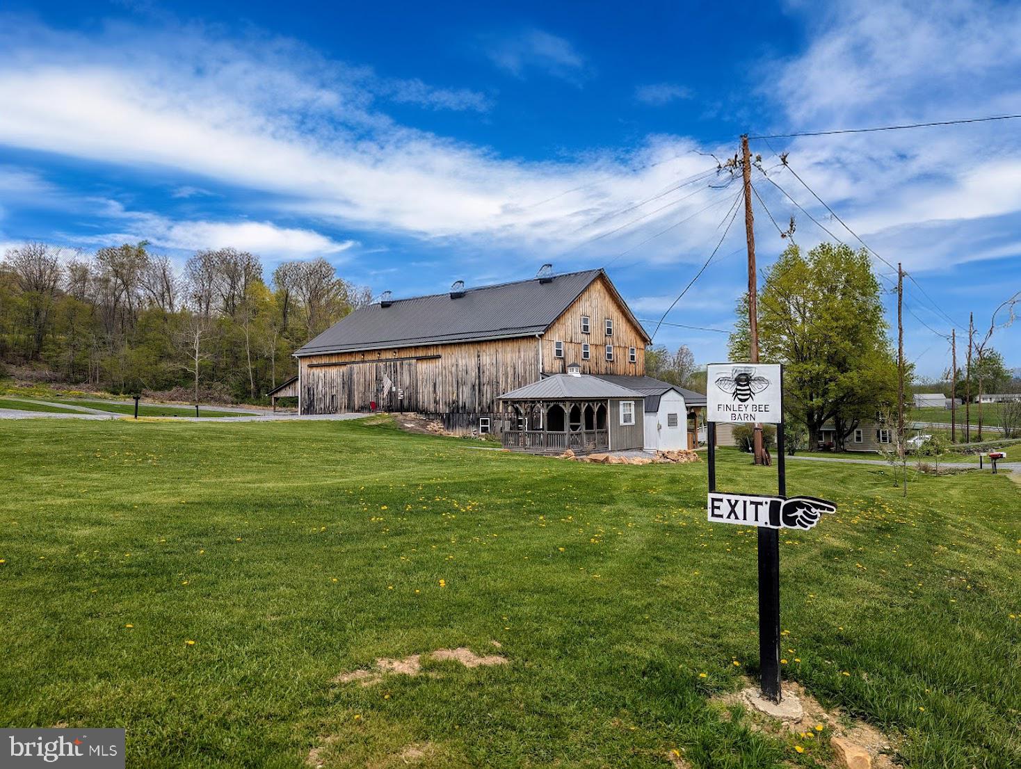 1568 Cumberland Road Bedford, PA 15522 - Photo 10 of 37 a front view of a house with a yard