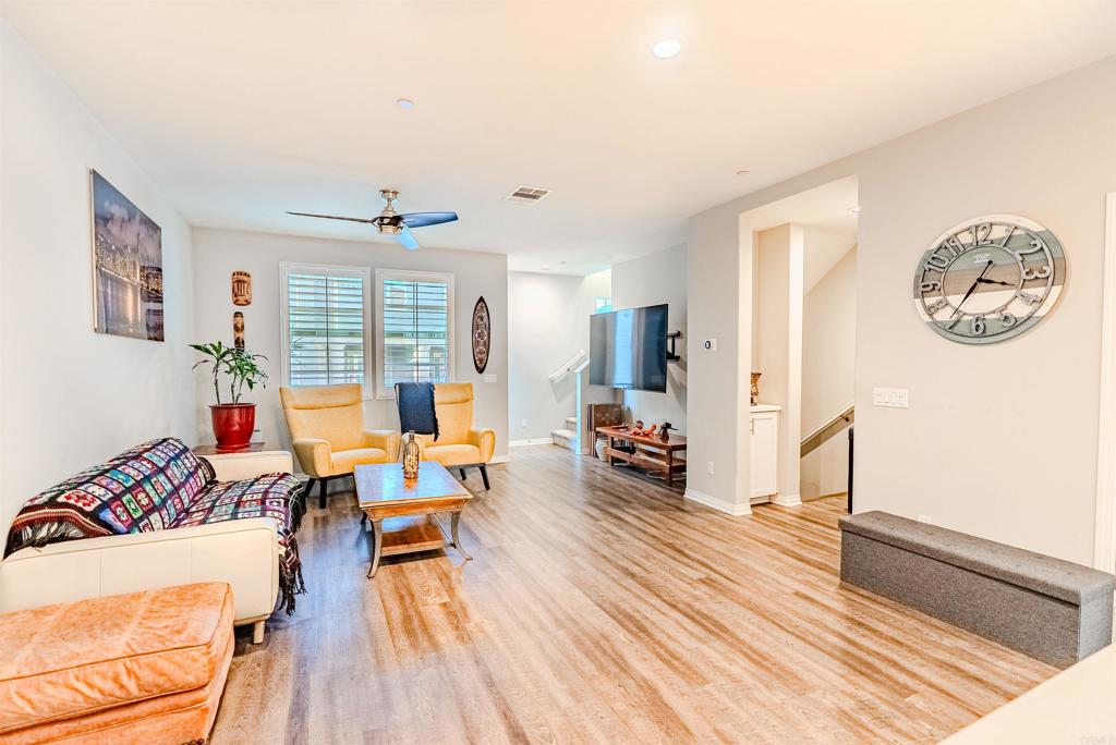504 Hummingbird Lane Imperial Beach, CA 91932 - Photo 11 of 25 a living room with furniture and wooden floor