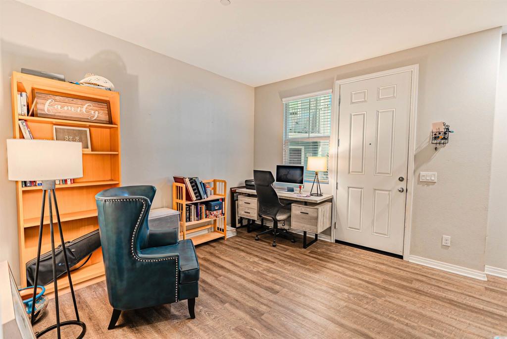 504 Hummingbird Lane Imperial Beach, CA 91932 - Photo 21 of 25 a view of a workspace with furniture and a window