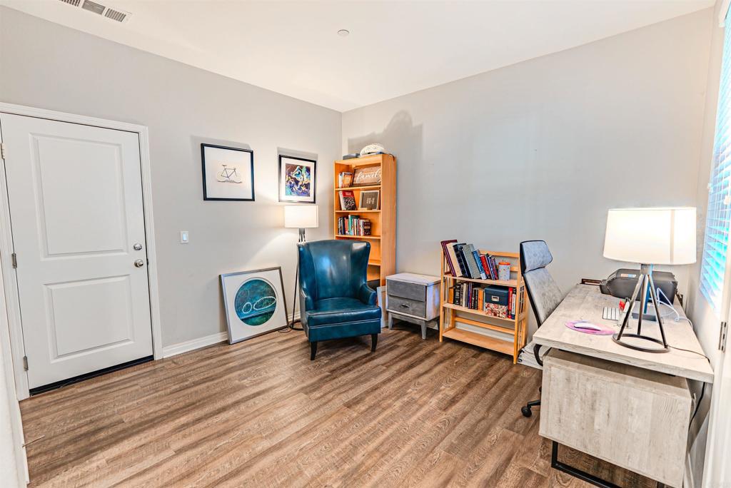 504 Hummingbird Lane Imperial Beach, CA 91932 - Photo 22 of 25 a living room with furniture and a wooden floor