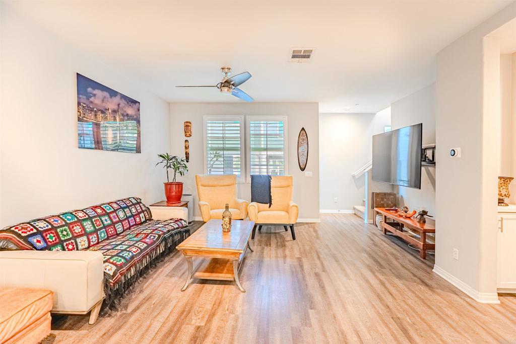 504 Hummingbird Lane Imperial Beach, CA 91932 - Photo 10 of 25 a living room with furniture and a wooden floor