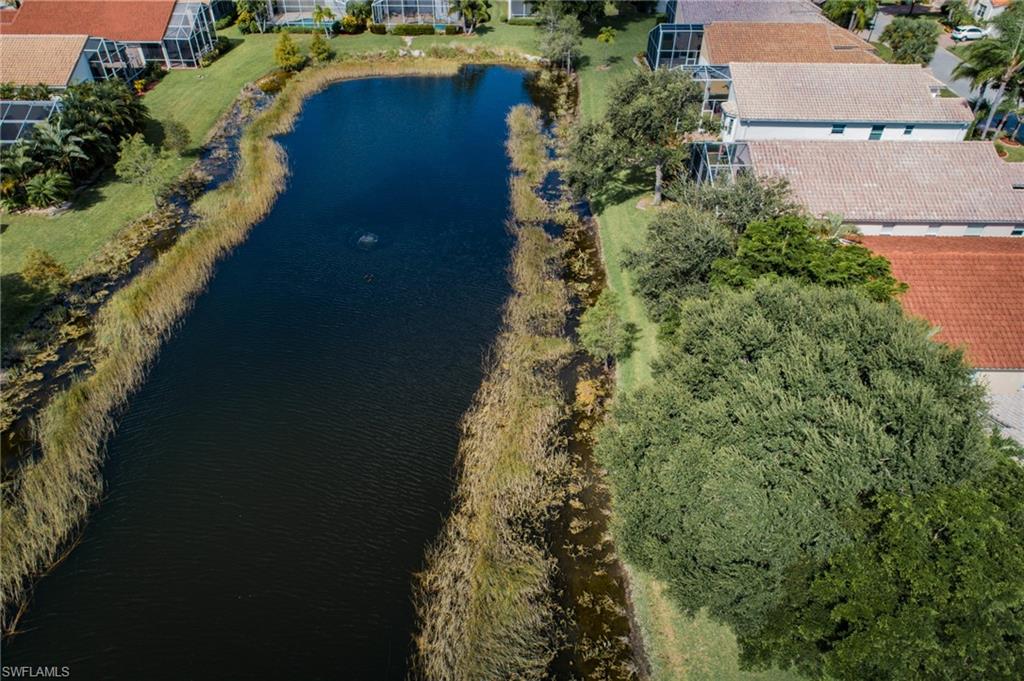9381 Springview Loop Estero, FL 33928 - Photo 21 of 35 an aerial view of a house with a yard