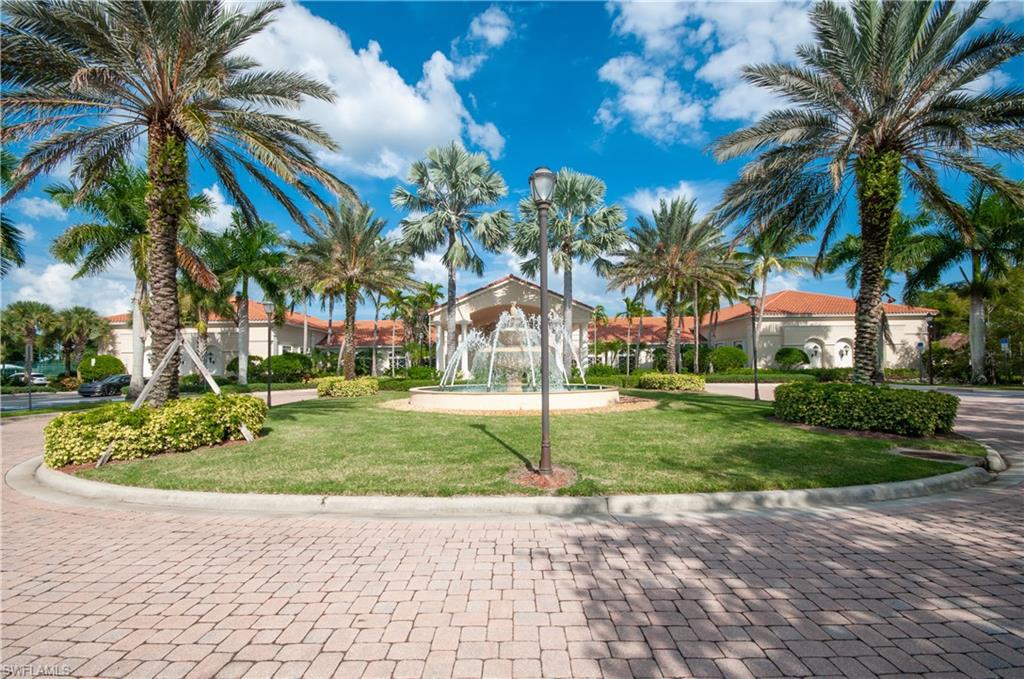 9381 Springview Loop Estero, FL 33928 - Photo 23 of 35 a view of a backyard with palm trees
