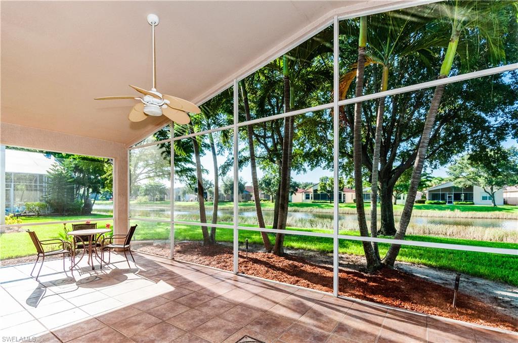 9381 Springview Loop Estero, FL 33928 - Photo 3 of 35 a view of a park with chairs in patio