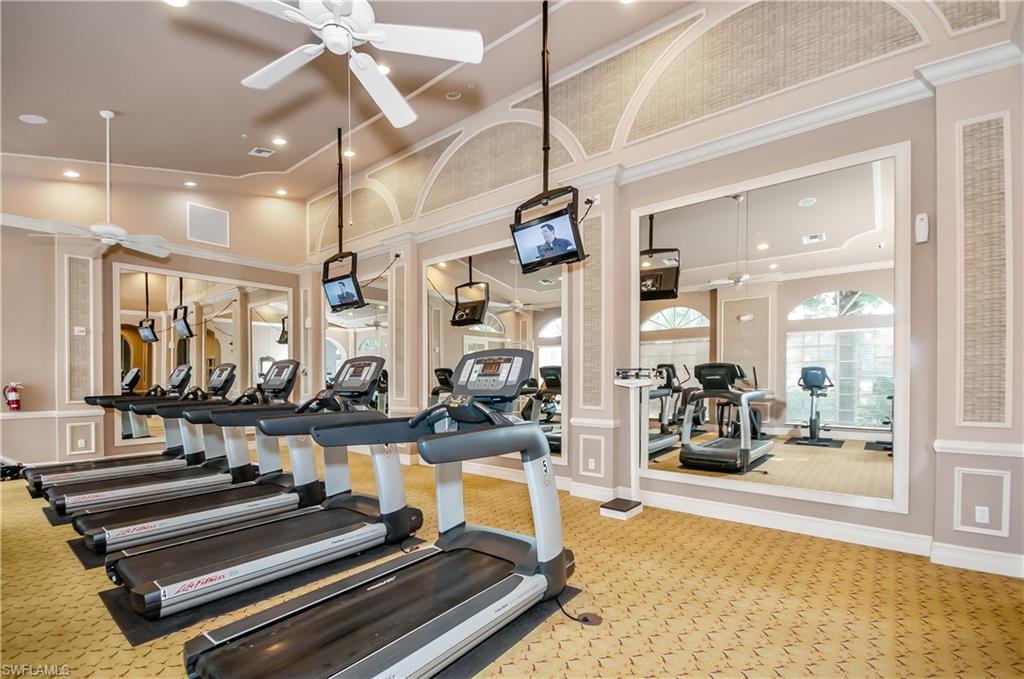 9381 Springview Loop Estero, FL 33928 - Photo 34 of 35 a view of a room with gym equipment