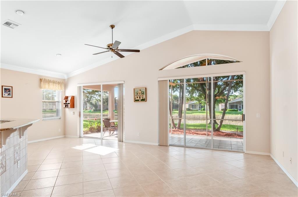 9381 Springview Loop Estero, FL 33928 - Photo 9 of 35 a view of an entryway with wooden floor