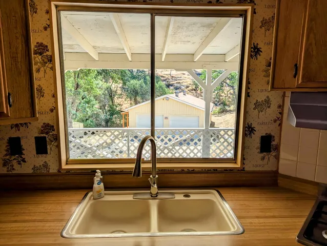 a view of a sink with an outdoor space