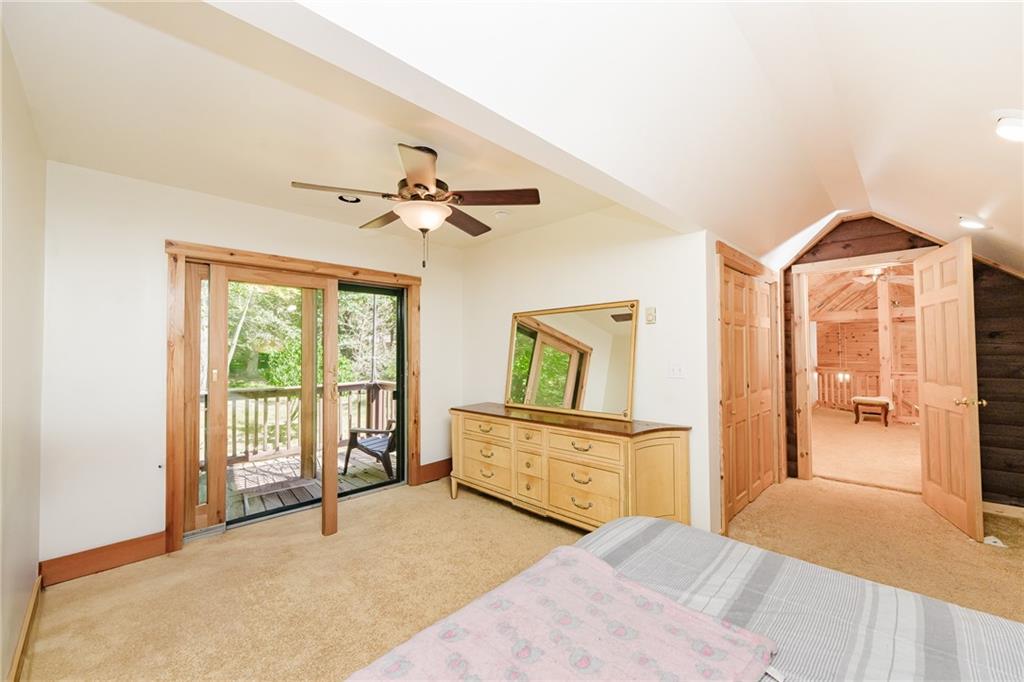 324 Troxell Spring Road Flinton, PA 16640 - Photo 32 of 50 a bedroom with furniture and a window