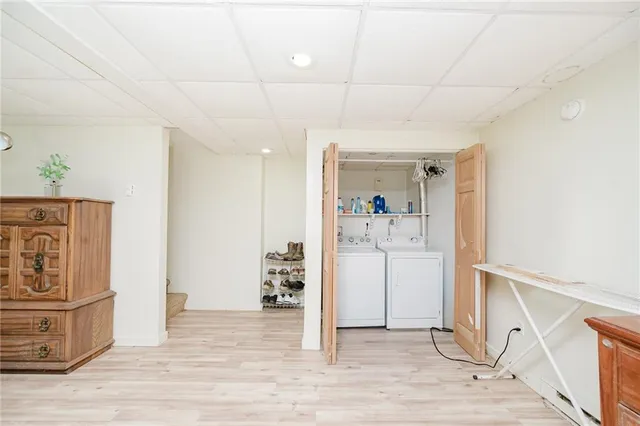 a view of a livingroom with wooden floor