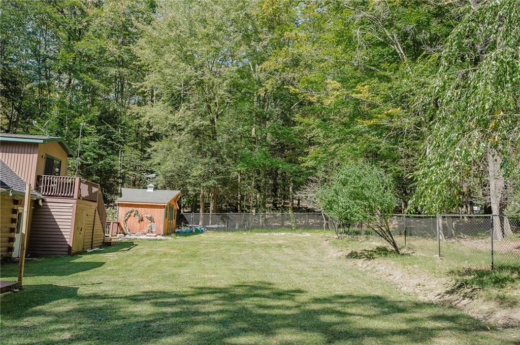324 Troxell Spring Road Flinton, PA 16640 - Photo 38 of 50 a backyard of a house with lots of green space